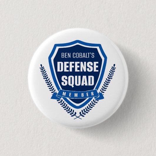 Button van de Defence Squad van Ben Cobalt (Voorkant)