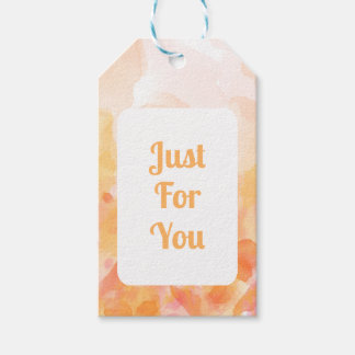 Cadeau labels met oranje waterverf achtergrond cadeaulabel