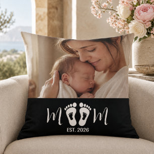 Cadeau met voetafdrukken van baby en oprichtingsda kussen