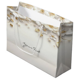 Cadeaubag met ivoorwitte bloemen en gouden bladere groot cadeauzakje