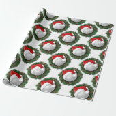 Cadeaupapier met novelty golfbal en kerstmuts (Uitgerold)
