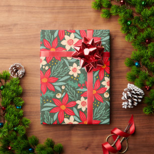 Cadeaupapier voor kerst met rode poinsettia.