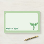 Caduceus met bladeren post-it® notes (Op bureau)