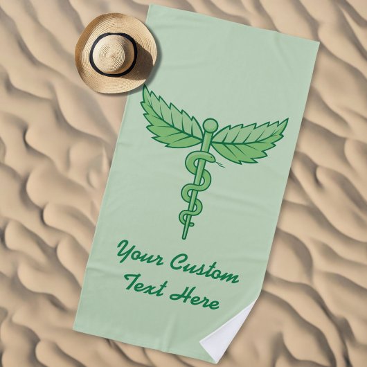 Caduceus met bladeren strandlaken