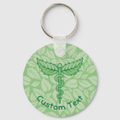 Caduceus met Sleutelhanger achtergrond met bladere (Voorkant)
