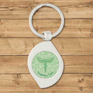 Caduceus met Sleutelhanger achtergrond met bladere