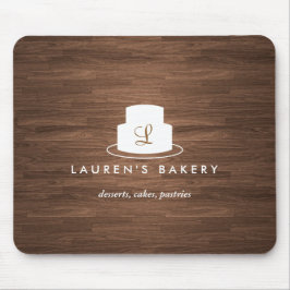 Cake Monogram Logo in Wit op bruine Woodgrain Muismat