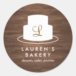 Cake Monogram Logo in Wit op bruine Woodgrain Ronde Sticker