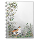 Calico Cat in de tuin Notitieboek (Voorkant)