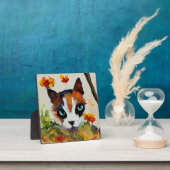 Calico-kat in de tuin fotoplaat (Insitu)