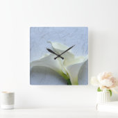 Calla-leugens op decoratieve achtergrond vierkante klok (Huis)