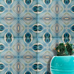Calming Soft Blue en Indigo geometrisch patroon Tegeltje<br><div class="desc">Deze keramische tegel vertoont een complex caleidoscopisch patroon. Het ontwerp is symmetrisch, met abstracte vormen die doen denken aan bloemen en geometrische figuren. De tegel is versierd met een kalmerend palet van verschillende tinten blauw, blauwgroen, crème en wit, die harmonieus mengen tot creëer met een visueel aangenaam effect. Het centrale...</div>