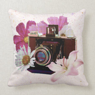camera met bloemen kussen