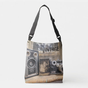 camera's met print crossbody tas