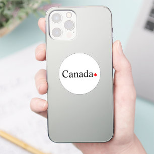 Canada typografie met rode esdoorn blad rond sticker