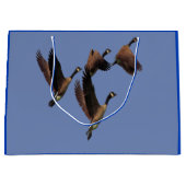 Canadese ganzen die in een kinder ontwerp van een  groot cadeauzakje (Voorkant)