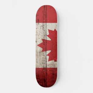 Canadese vlag op oude houten korrels persoonlijk skateboard