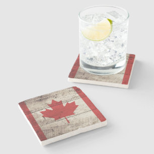 Canadese vlag op oude houten korrels stenen onderzetter