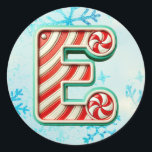 Candy Cane Christmas "E" Sticker, feestelijke stre Ronde Sticker<br><div class="desc">Voeg een feestelijk tintje toe aan uw kerstcadeaus en inrichting met deze ronde stickers met de letter "E" in een vrolijk snoeprietjesontwerp. Ideaal voor het personaliseren van cadeaus, kaarten en feestartikelen! Personaliseer dit ontwerp met een monogram, naam of foto. © Copyright 2024 P.D., Vakantiepatronen & Schilderijen & Grafieken. Alle rechten...</div>