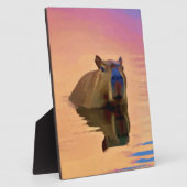 Capibara komt uit een rustig meer fotoplaat (Zijkant)