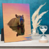 Capibara komt uit een rustig meer fotoplaat (Zijkant)