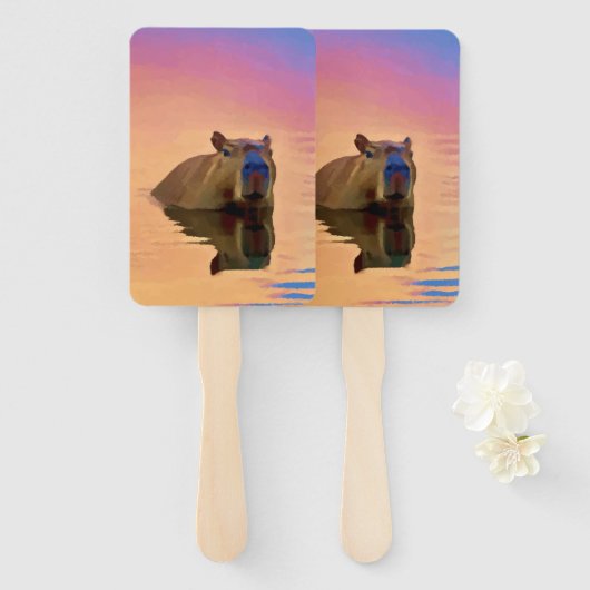 Capibara komt uit een rustig meer handwaaier (Voorkant en achterkant)