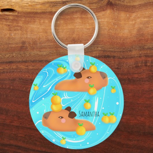 Capybaras in water met Sinaasappels Sleutelhanger (Achterkant)