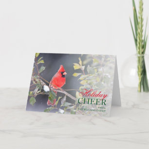 Cardinal Posing on Holly Tree Branch Feestdagen Kaart