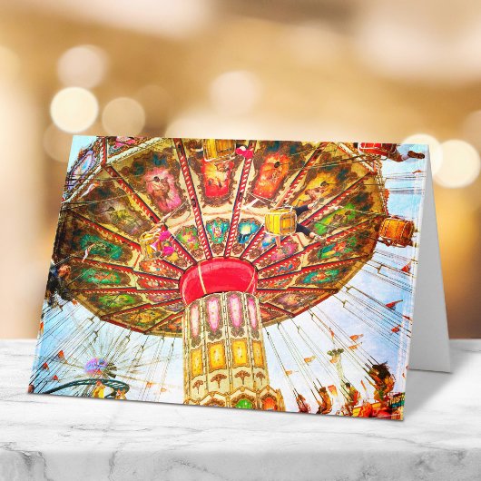 Carnaval swing ride foto  retro blauwe lucht kaart