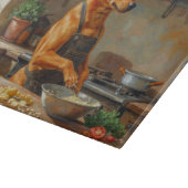 Carolina-hond kookt in keuken snijplank (Hoek)