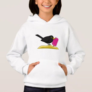 Cartoon Blackbird die een ijskap eet