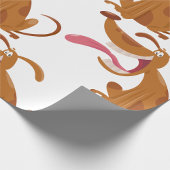 Cartoon hond met grote glimlach en tong uit cadeaupapier