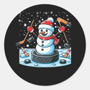 Cartoon ijshockey puck sneeuwman met kerstmuts chr ronde sticker