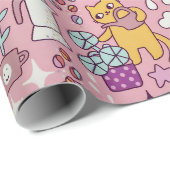 Cartoon kat plezier op roze cadeaupapier (Rol Hoek)