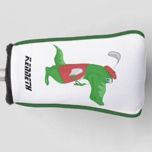 Cartoon krokodil die golf speelt met een rood pet. golfheadcover