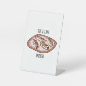 Cartoon met chocolade eclair reclamebord met voetstuk (Voorkant)