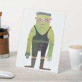 Cartoon monster met groene huid reclamebord met voetstuk (Insitu)