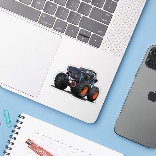Cartoon monstertruck sticker (Laptop met iPhone)