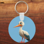 Cartoon ooievaar met felle ogen op houten hek sleutelhanger (Achterkant)
