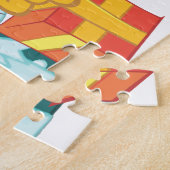 Cartoon santa claus en cadeaudoos legpuzzel (Zijkant)