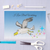 Cartoon seagull vliegt over kop met een blauwe luc tissuepapier (Craft)