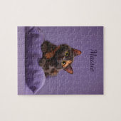 Cartoon Tortoiseshell Kitten op Paarse Kussen Legpuzzel (Horizontaal)