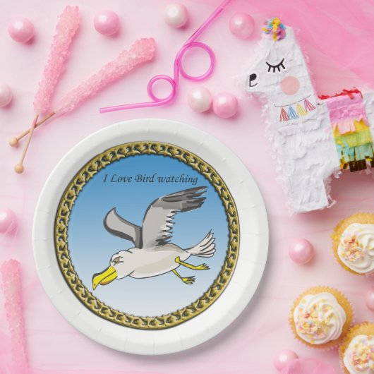 Cartoon zeemeeuw met een gouden lijst boven haar h papieren bordje (Feest)