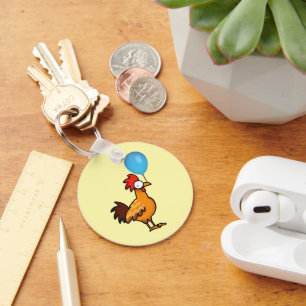 Cartoonhaan met blauwe ballon sleutelhanger