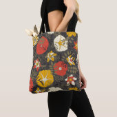 cartoons bladeren en bloemen op een donkere achter tote bag (Dichtbij)