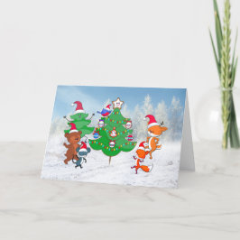Cartoons dansen rond de kerstboom feestdagen kaart