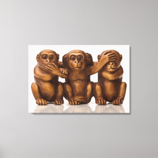Carving of three wooden monkeys canvas afdruk (Voorkant)