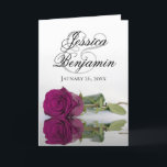 Cassis Magenta Roze Elegante Romantische Foto Huwe<br><div class="desc">Deze prachtige trouwkaarten hebben een verbluffend ontwerp met een enkele langstelige cassis paarse, magenta of beskleurige roos die weerspiegelt in water met golven en rimpelingen. De voorkant toont de voornamen van het paar in fancy script lettertype. Binnenin is ruimte voor de foto van het paar samen met alle gebruikelijke uitnodigingsinformatie....</div>