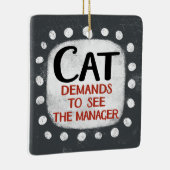 Cat eist Ornament van manager te zien (Rechts)