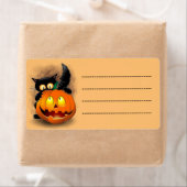 Cat Fun Halloween Character die op een pompoen tik Etiket (Insitu)